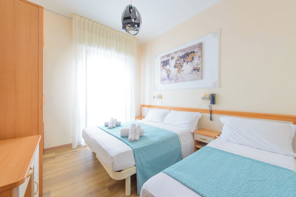 Standard Triple Room, Balcony | In-room safe, desk, laptop workspace, free WiFi