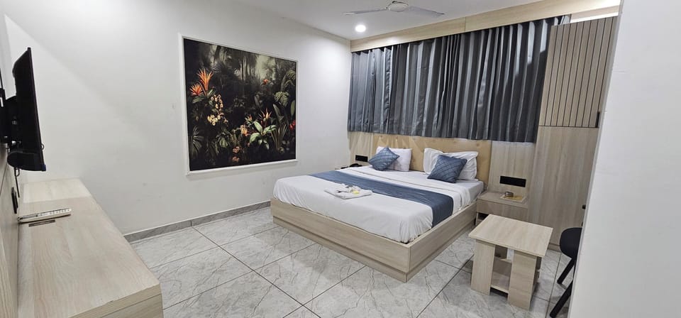 Deluxe Double Room, City View | Laptop workspace, iron/ironing board, free WiFi