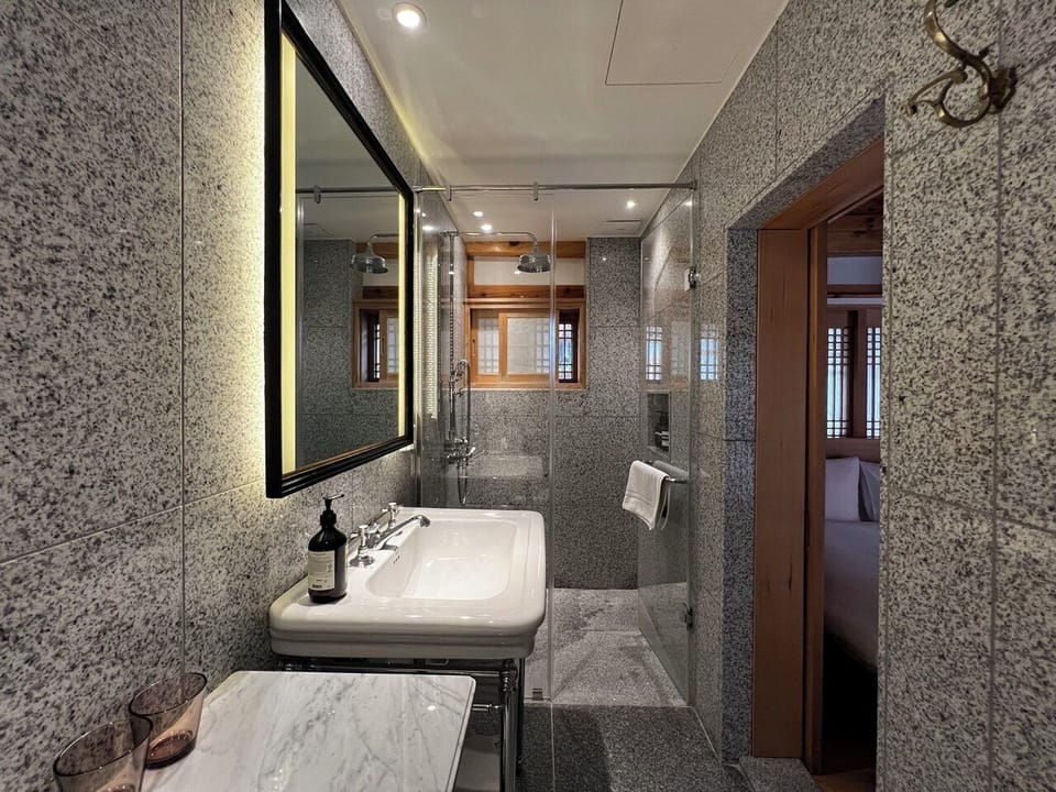 Classic Double Room, 1 Queen Bed, Private Bathroom, Courtyard View | Bathroom | Hair dryer, towels, soap, shampoo