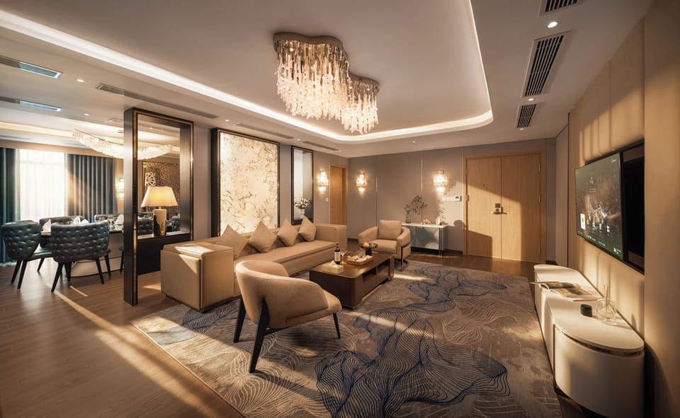 Presidential Suite | Living area | 60-inch Smart TV with digital channels