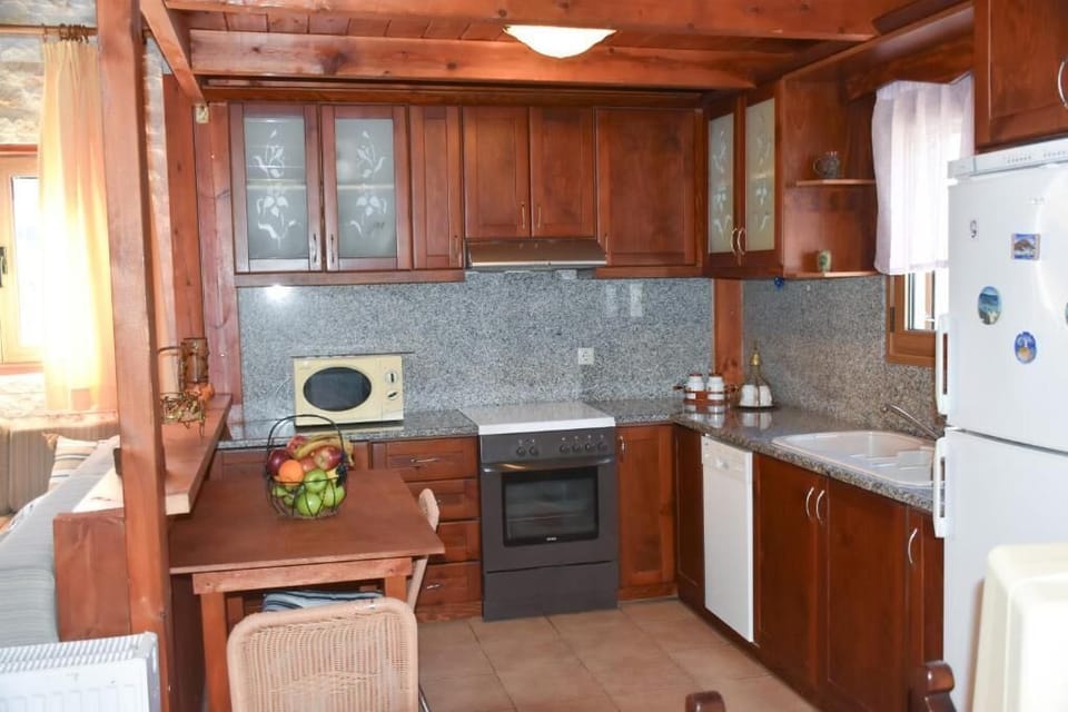 Fully Equipped Rustic Kitchen with Wooden Cabinets