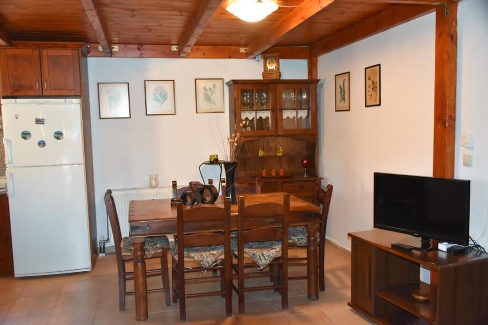 Cozy Dining Area with Traditional Decor and Wooden Details