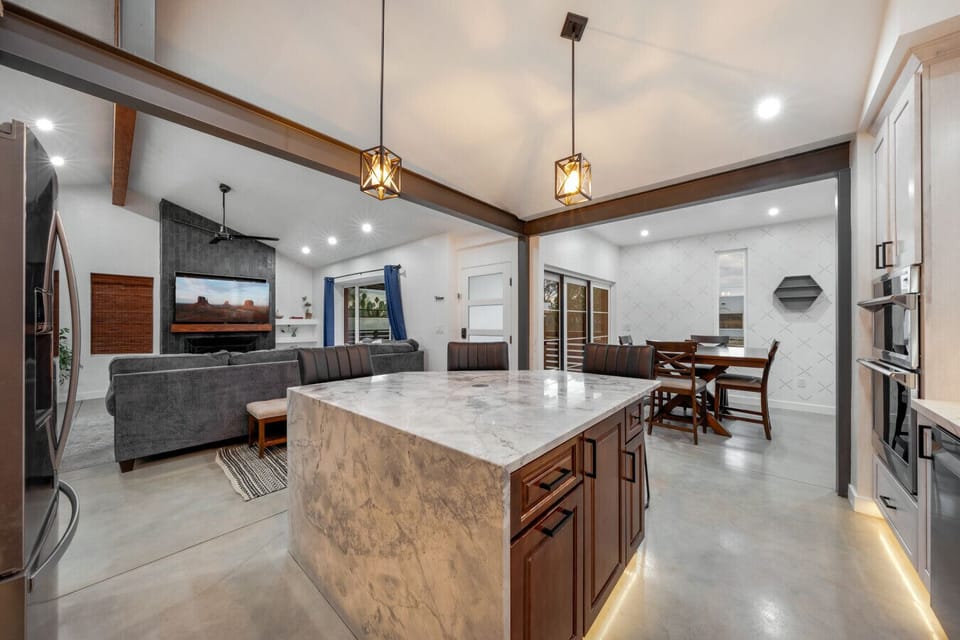 Spacious, open layout with living room, kitchen, and dedicated dining space