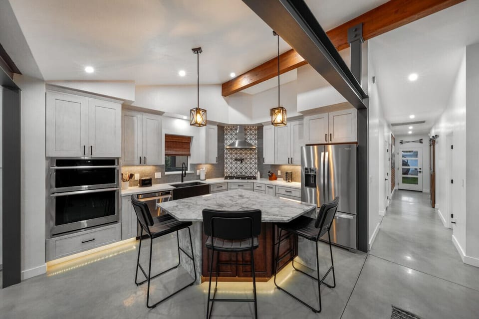 Updated, well-equipped, and fully stocked kitchen, ideal for easy meals and relaxed dining at home