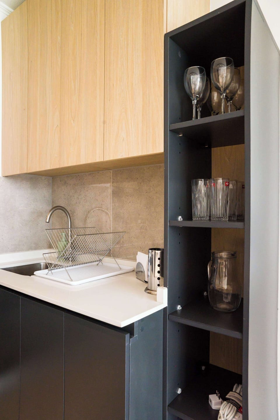 Sleek kitchen with modern cabinetry and ample storage, ideal for culinary adventures during your stay.