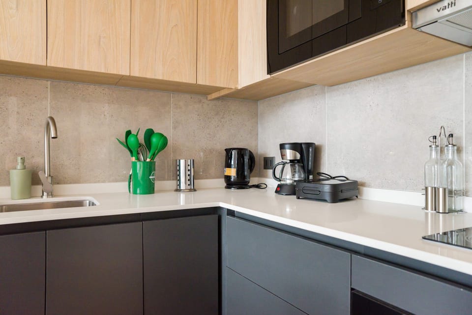 Sleek and modern kitchen with all essentials for a comfortable stay in the heart of Chile.