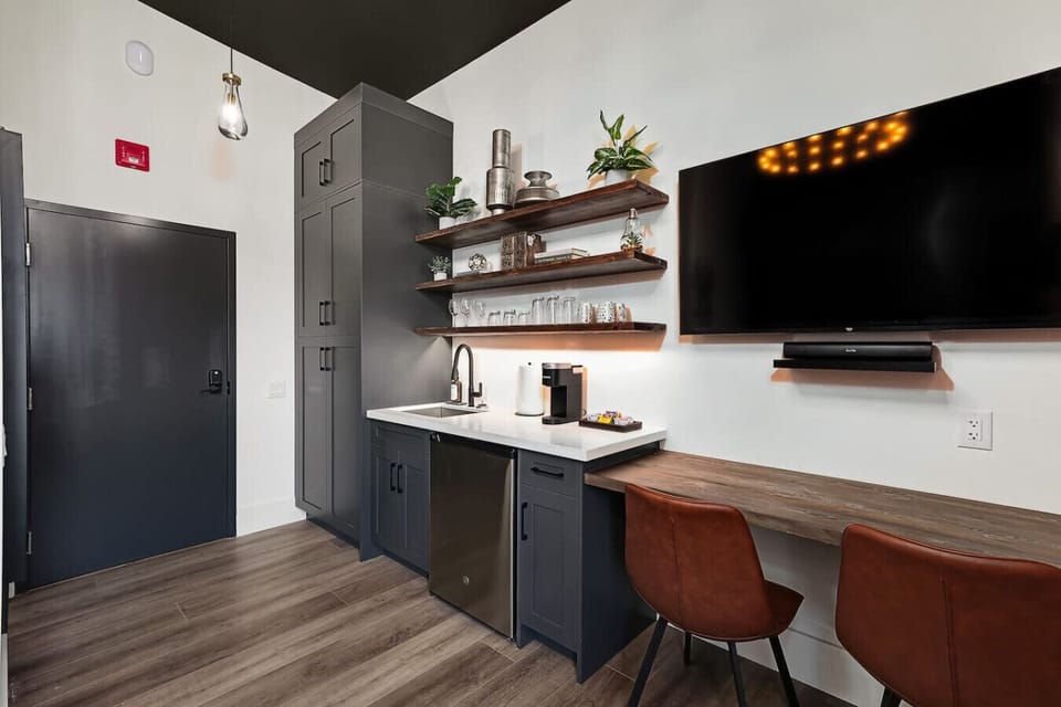 The open layout makes relaxing, dining, and watching TV easy, all in one welcoming space.