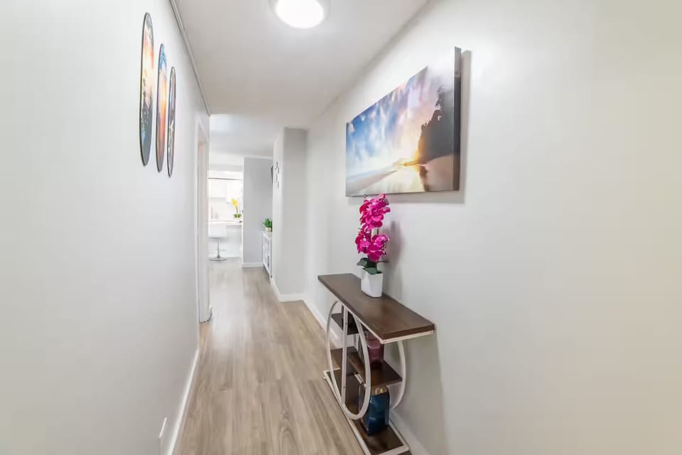 Hallway to full bathroom