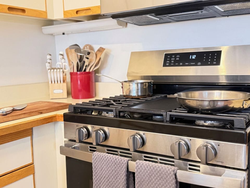 Master your favorite recipes using the powerful gas range and premium cookware.