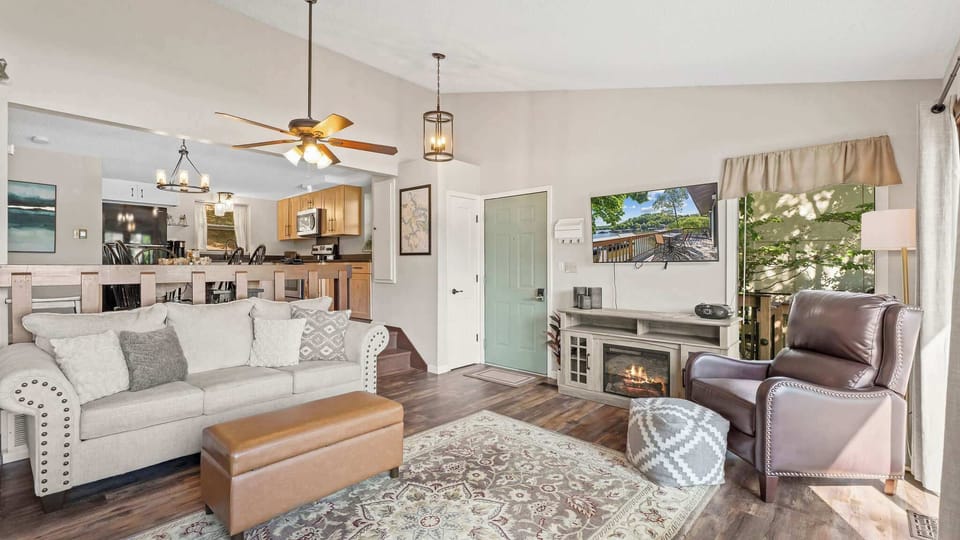 Bright living area with Smart TV and sofa sleeper 