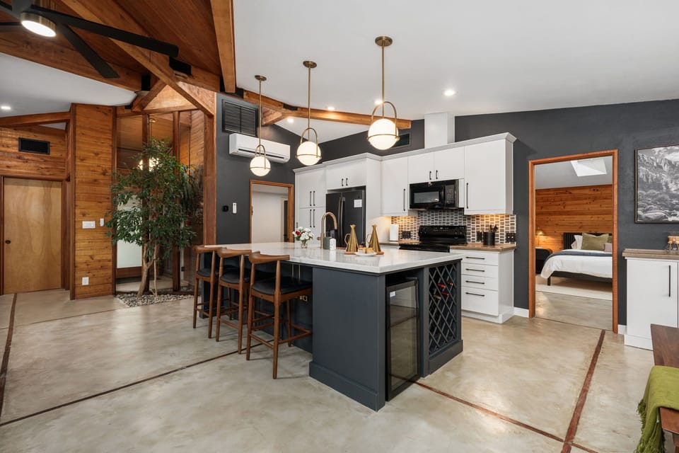 The updated kitchen and dining area offer plenty of room to comfortably host family dinners and are outfitted with all the cookware, dishes, utensils, and appliances you will need to cook delicious meals.