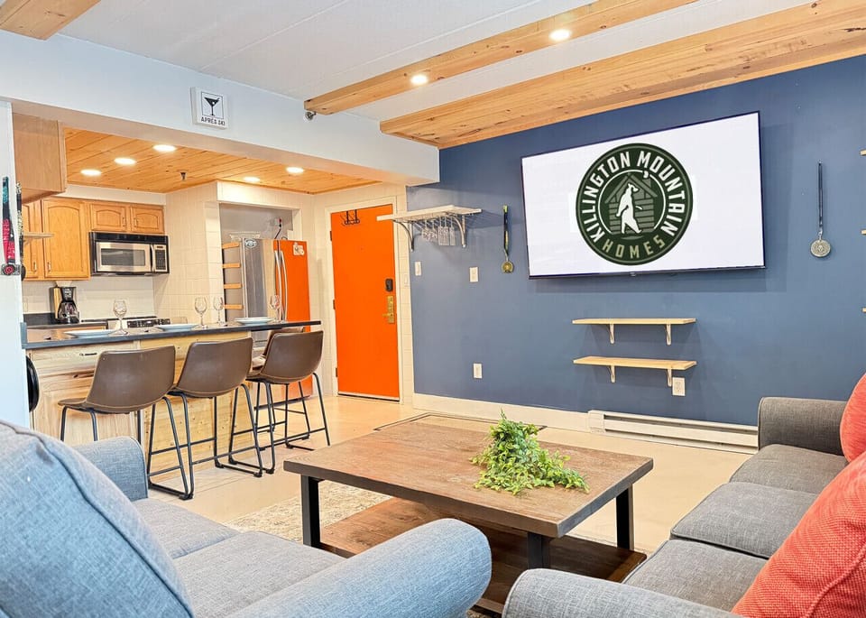 Open-concept area with dining seating for four.