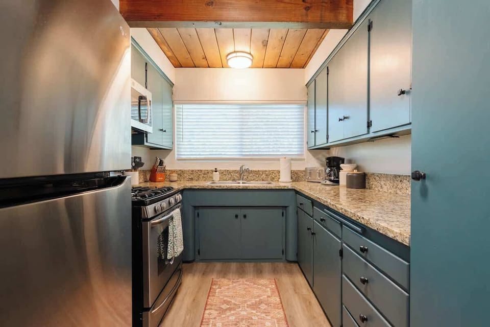 The heritage style kitchen comes fully equipped with everything you could need