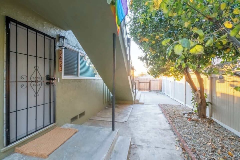Pass by the loaded citrus tree and into the lower-level apartment