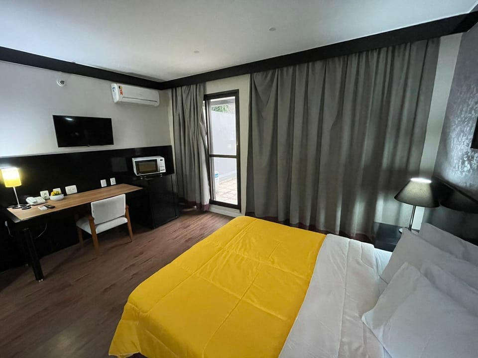 Apartment, Pets Allowed, Garden View | In-room safe, blackout drapes, iron/ironing board, WiFi (free)