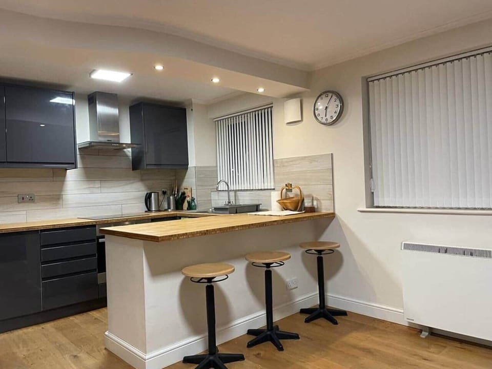 Semi open kitchen with breakfast bar