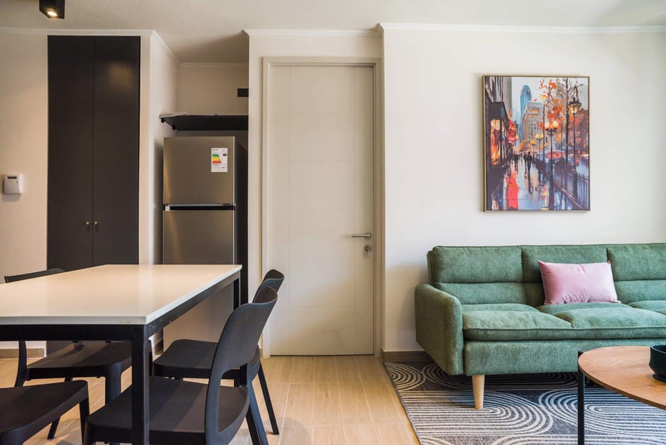 Stylish living area with modern decor, perfect for relaxation and dining.