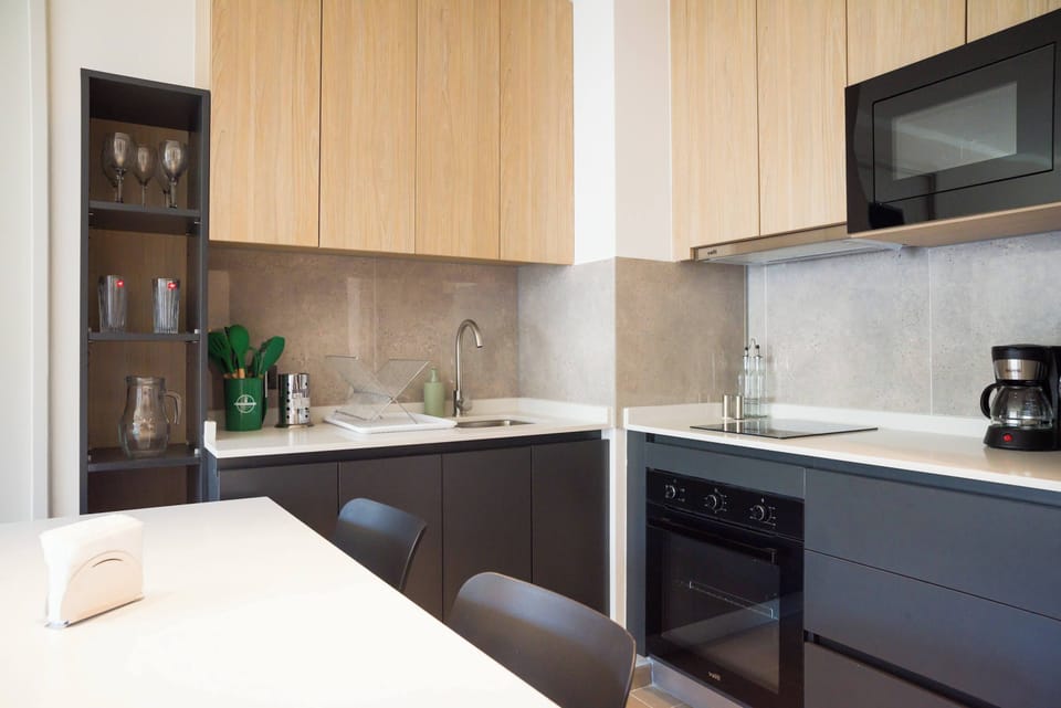 Sleek and modern kitchen with all essentials for a comfortable stay.