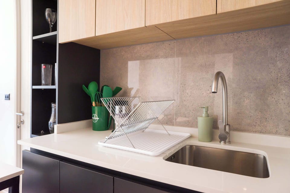 Sleek and modern kitchen with stylish finishes, perfect for preparing meals during your stay.