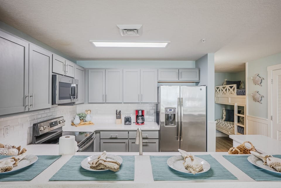 “Fully stocked —  Keurig, coffee pot & more. Bring groceries, not appliances.”