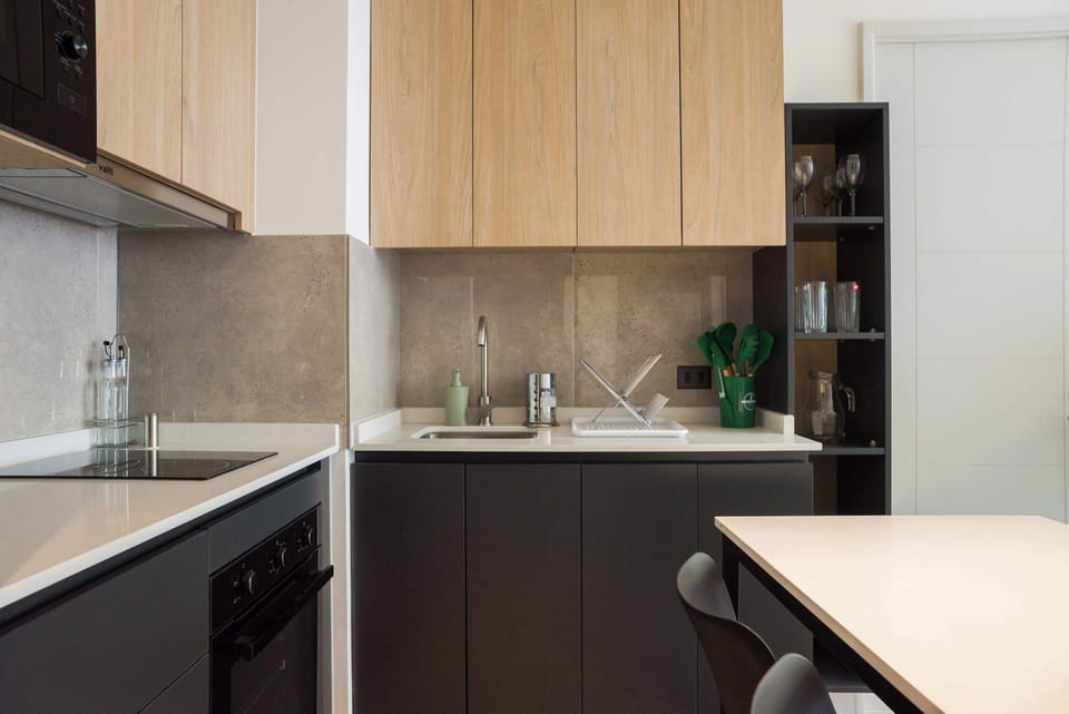Sleek, modern kitchen with stylish cabinetry and all essentials for a comfortable stay.
