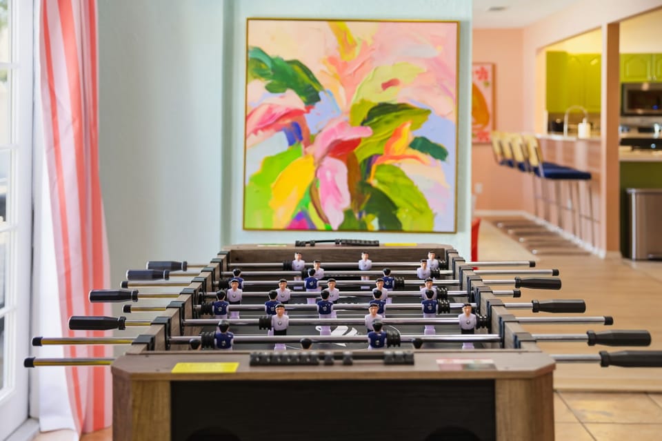 Spin, score, repeat! Challenge your friends or family to a fast-paced foosball match and let the laughter flow.