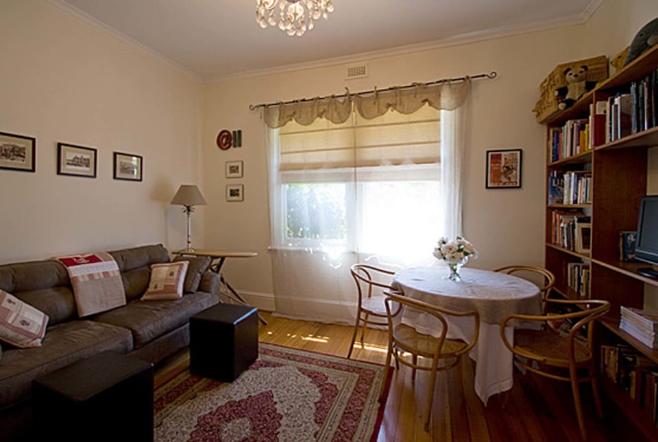 House, 1 Bedroom | Living area | Flat-screen TV, DVD player