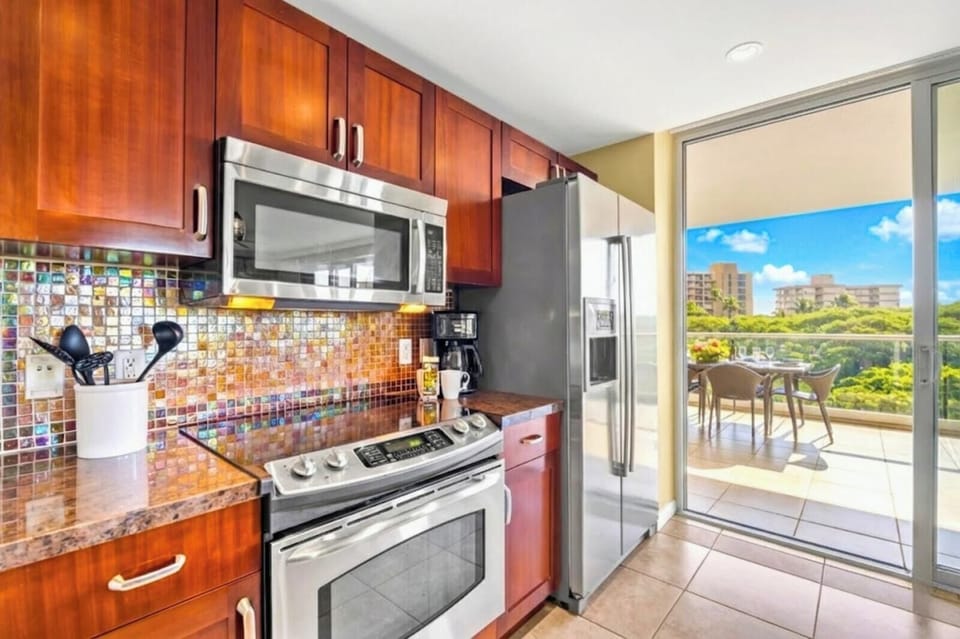 Prepare meals in a modern kitchen filled with natural light