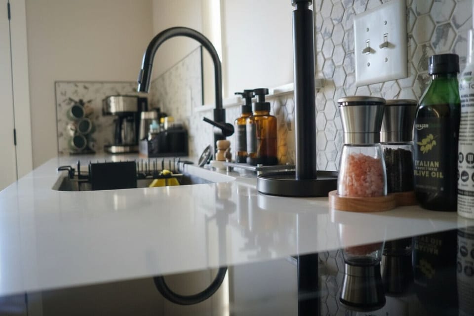 Kitchen Accessories Thoughtfully Stocked for Easy Cooking – Our modern kitchen is equipped with premium accessories to make every meal a joy: sharp knives, sleek utensils, cutting boards, and stylish serving pieces – all ready for family breakfasts or rom