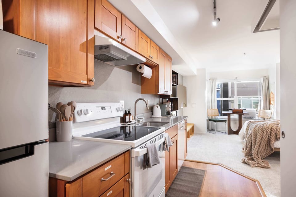 Prep snacks in this spacious kitchen, then step right into the cozy studio—ideal for seamless, stress-free stays.