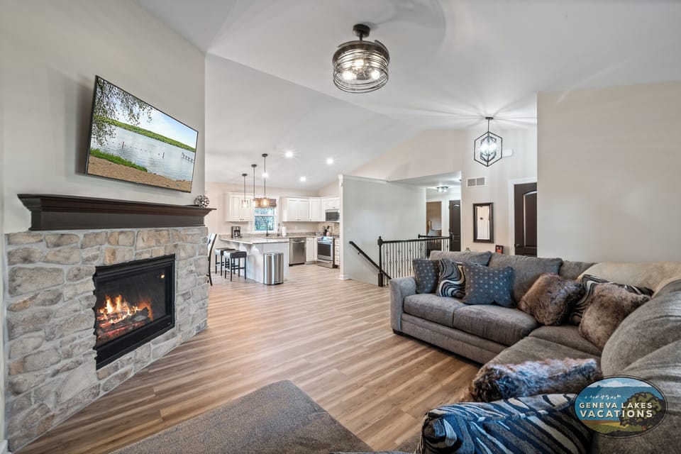 Open concept living room to dining and kitchen.