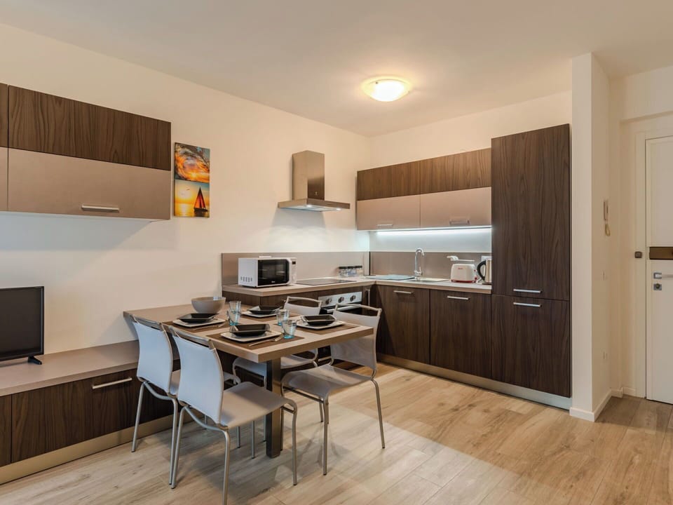 Interior Design, Wood, Flooring, Room, Furniture, Cabinetry, Floor, Countertop, Ceiling, Kitchen