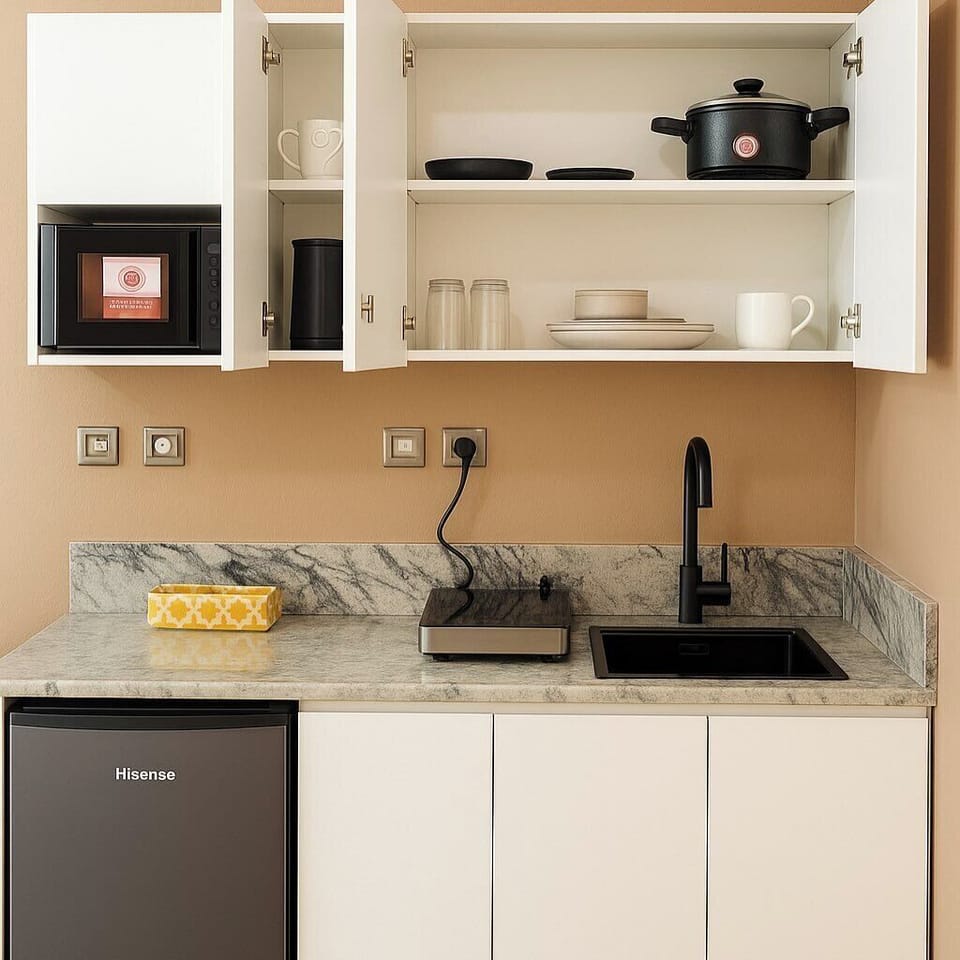 Economy Apartment, Balcony, City View | Private kitchen | Fridge, microwave, oven, stovetop