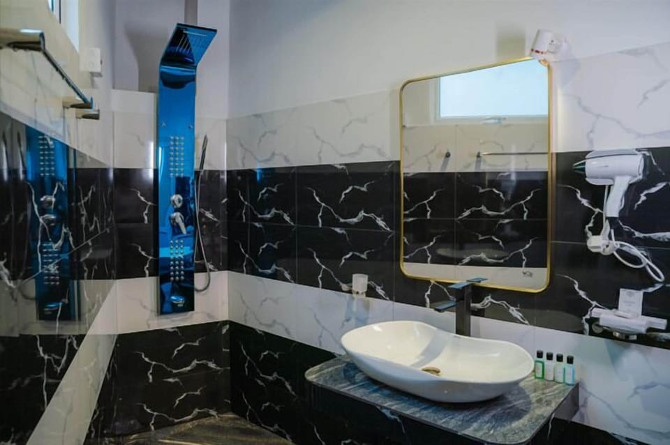 Shower, towels, soap, shampoo