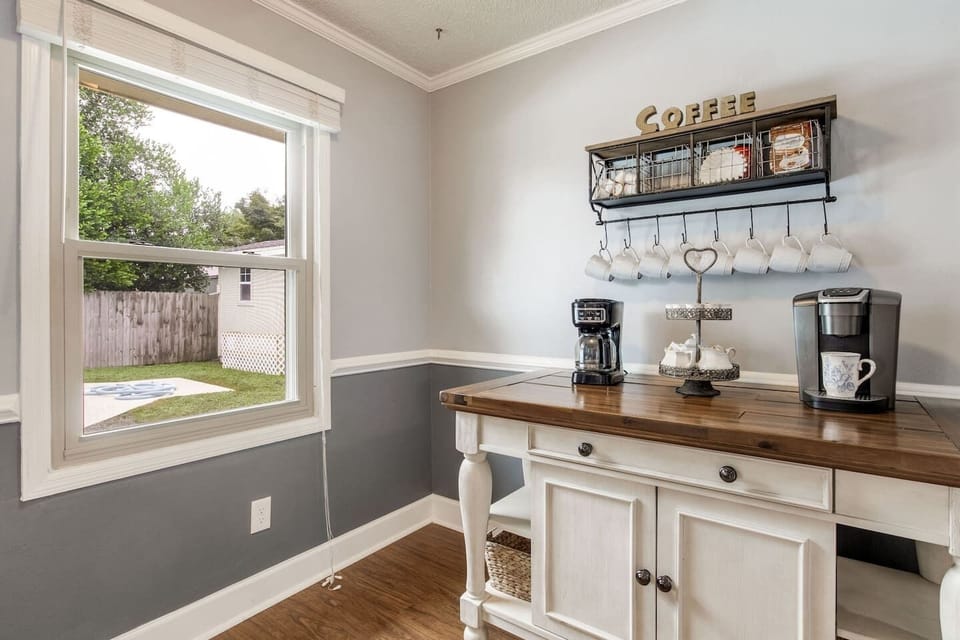 Have a hot cup of morning coffee at our well stocked coffee bar with a view outside to the pool area!