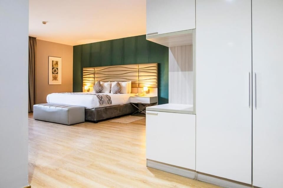 Deluxe Double or Twin Room, Balcony, Beach View | In-room safe, desk, laptop workspace, soundproofing