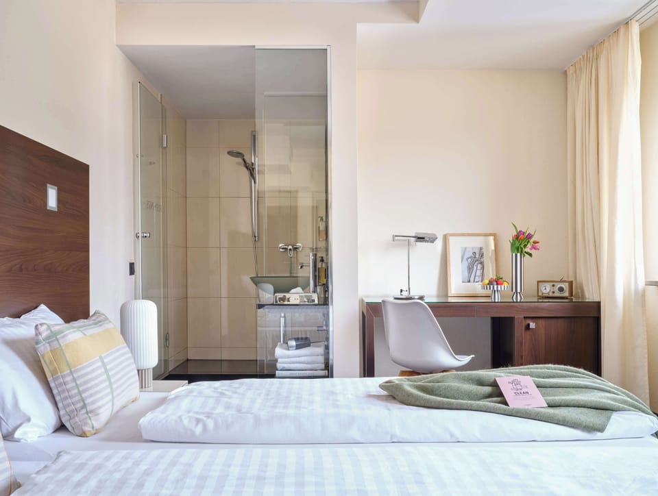 Hypo-allergenic bedding, in-room safe, desk, laptop workspace