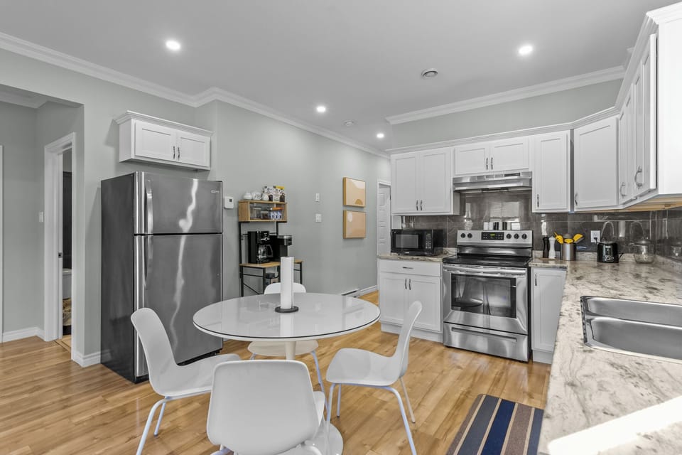 Cook with ease in the fully equipped kitchen and gather at the stylish dining table for meals made to share.