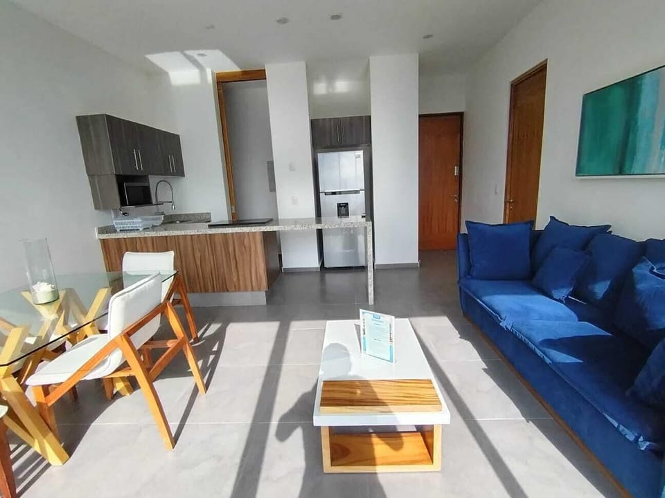 Comfort Apartment, Air conditioning, Garden Area | Living area | Flat-screen TV