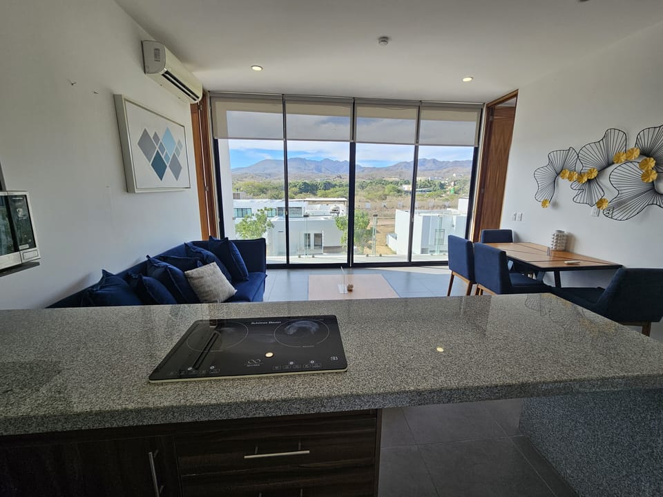 Comfort Apartment, Mountain View | Private kitchen | Full-size fridge, stovetop, cookware/dishes/utensils, cleaning supplies