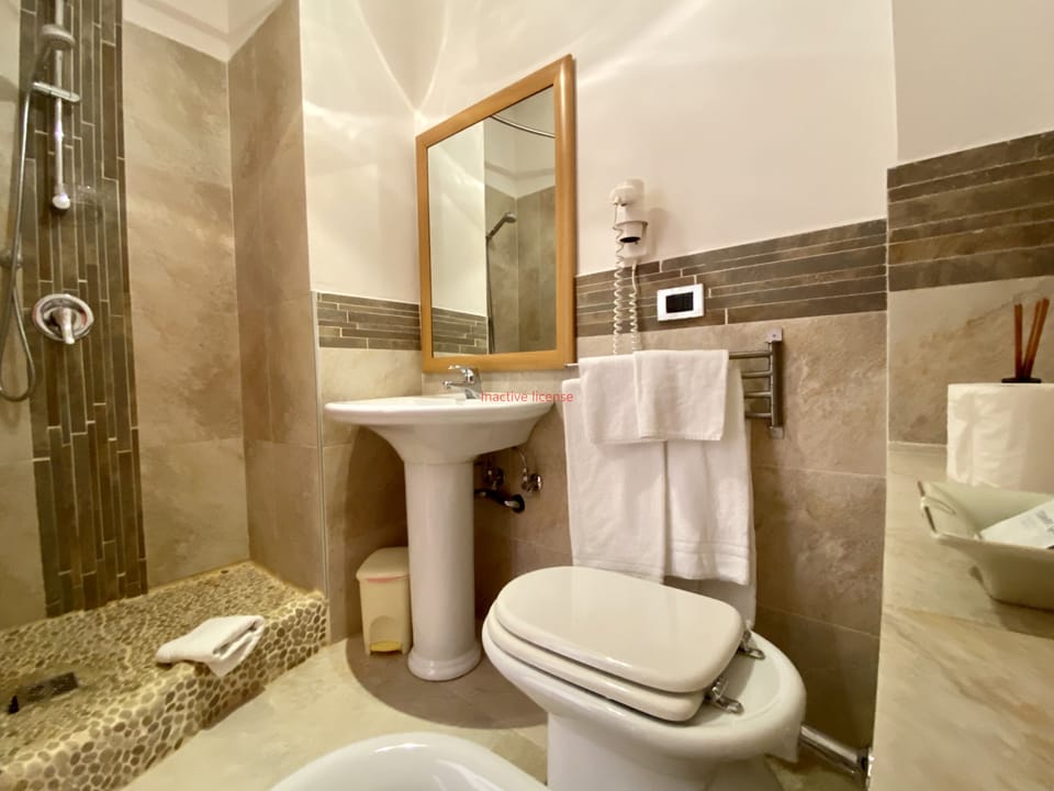 Comfort Double Room | Bathroom | Shower, free toiletries, hair dryer, bathrobes
