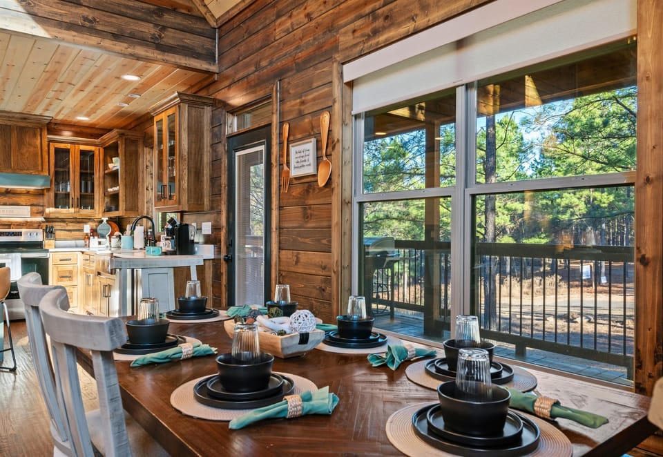This view highlights just how spacious and airy the dining area feels, with sunlight pouring in and plenty of room to linger over meals.
