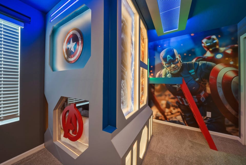 Step into a vibrant space adorned with colorful superhero murals and playful lighting that adds a whimsical touch. The unique wall designs and accents create an exciting atmosphere, perfect for fans and families alike.