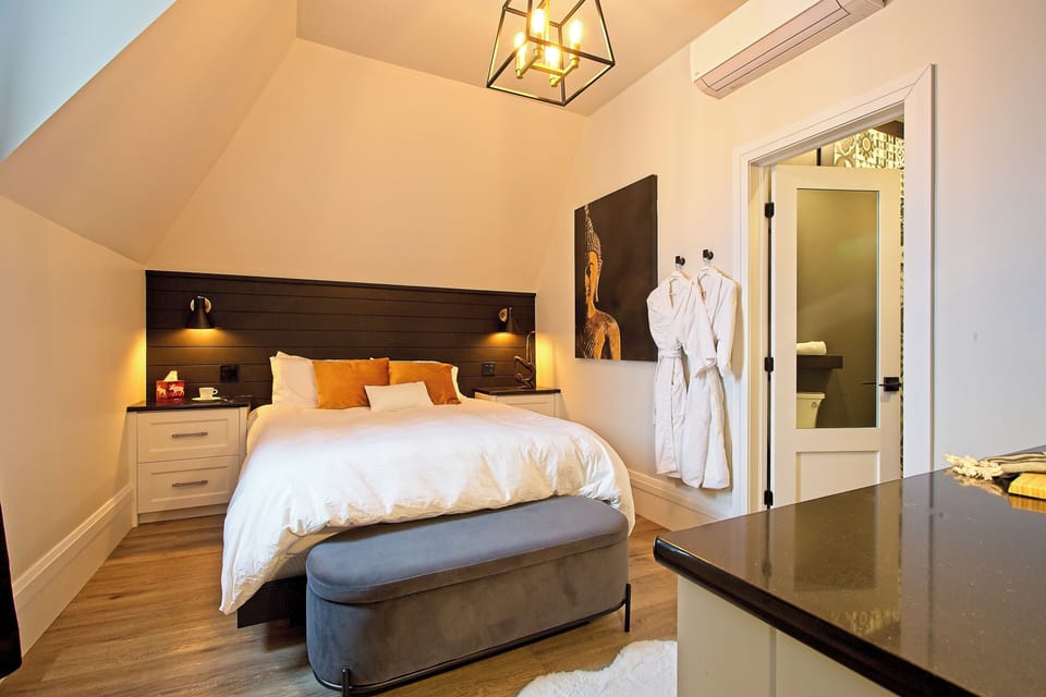 Luxury Room 1 | Premium bedding, blackout drapes, soundproofing, iron/ironing board