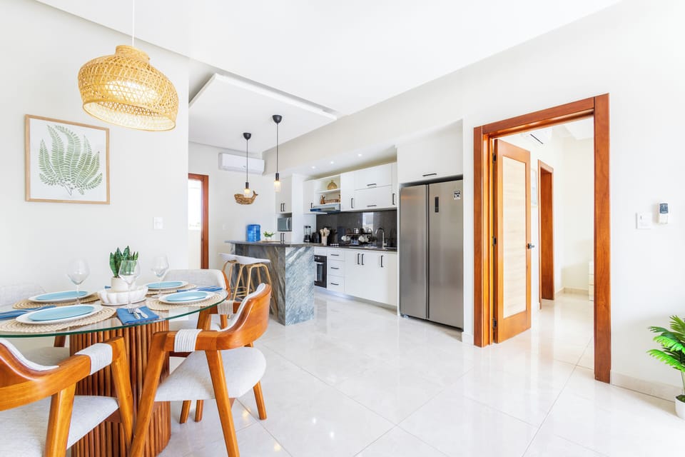 Deluxe Apartment, Pool View | Living area | Flat-screen TV