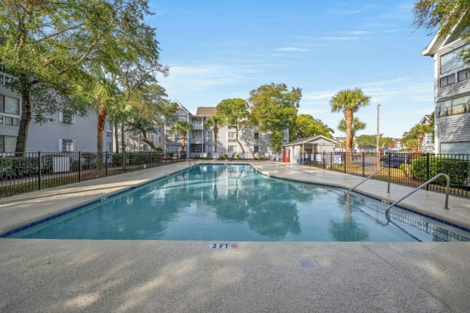 Take a cool dip in the pool after a day at the beach.