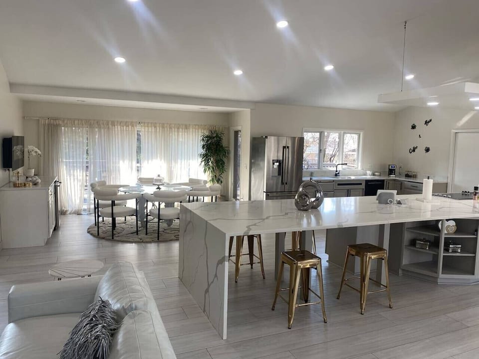 Kitchen island with bar stool seating and open layout
