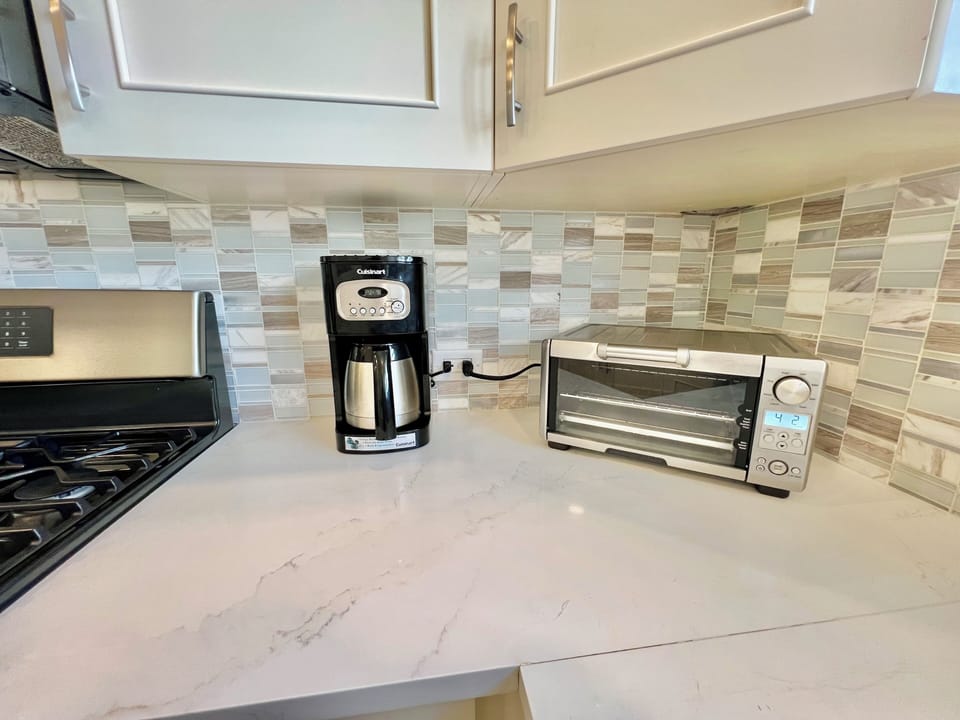 Drip coffee maker and toaster oven.