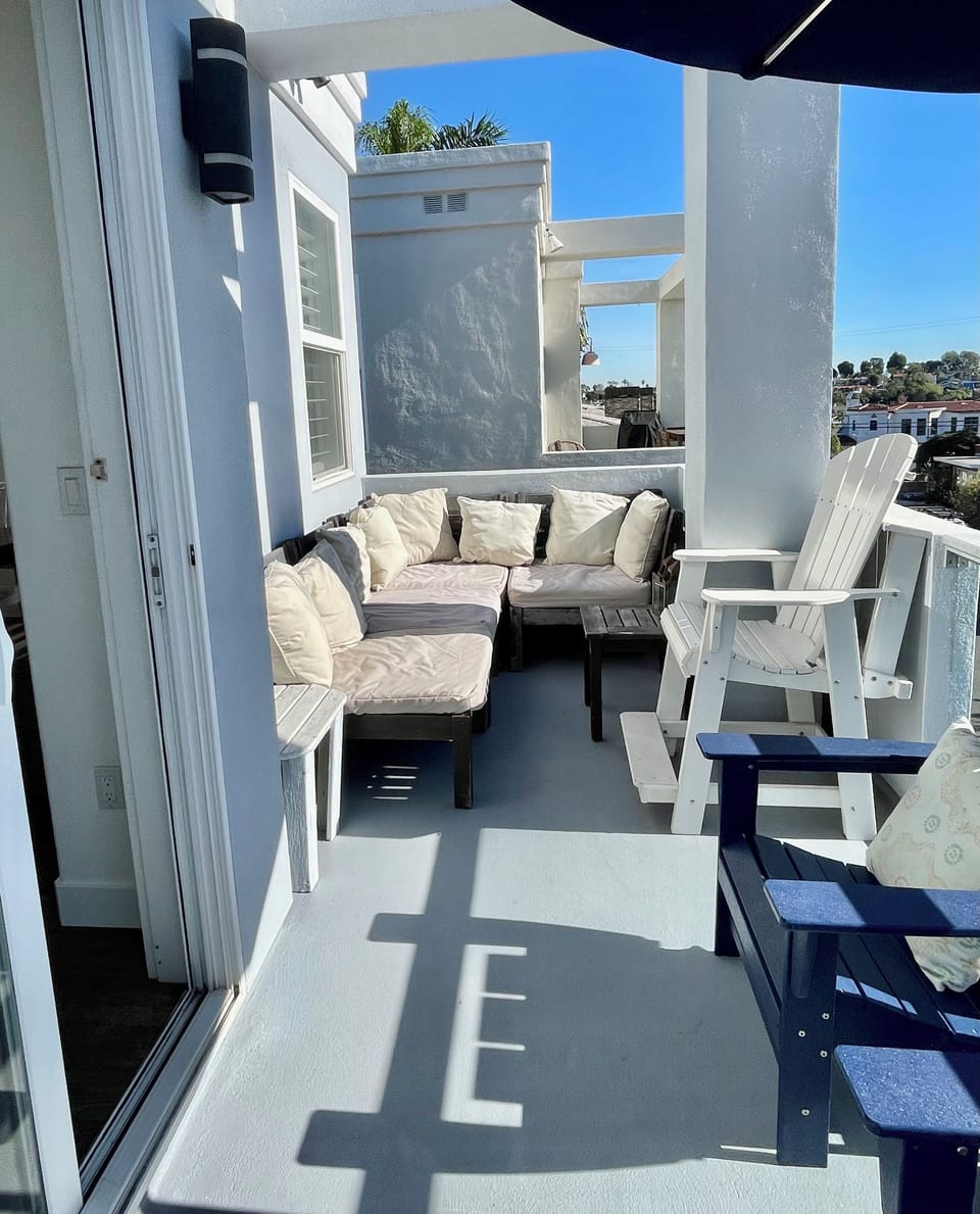 Private 3rd Floor deck with seating and views.