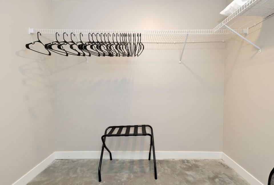 Main level bedroom walk in closet